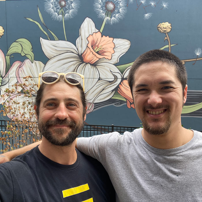 mural artists Hank Vohrer and Hiro hubbard at Brightview Hunt Valleya